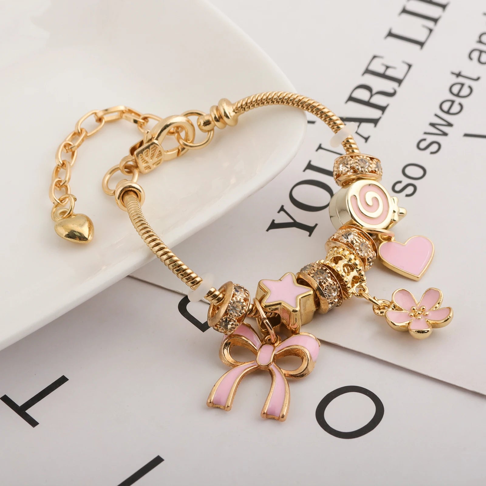 Adjustable Pink Heart Shaped DIY Bracelet Featuring Bow and Heart Charm Suitable for Everyday Wear or as a Valentine's Day Gift